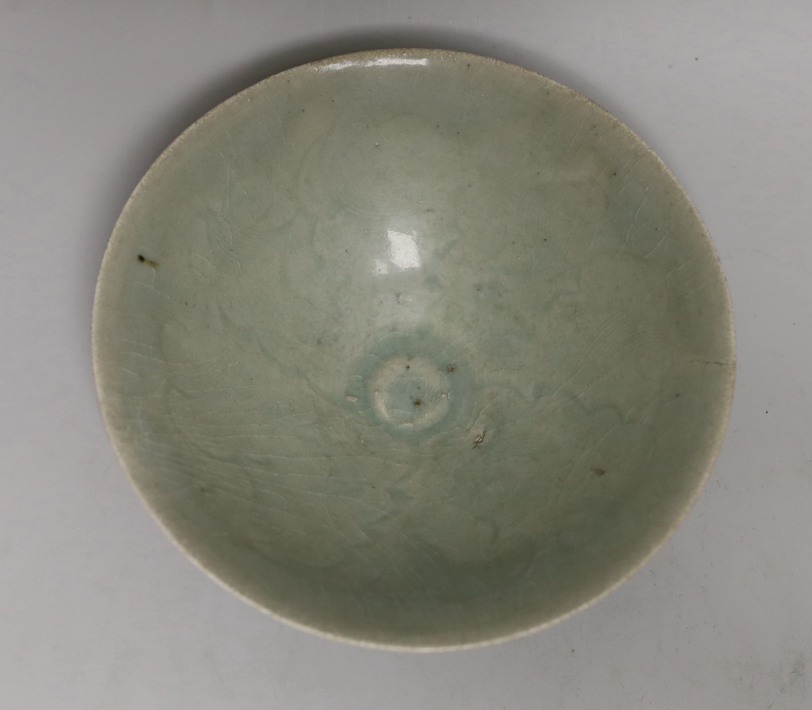 A Chinese celadon bowl, 17cm diameter